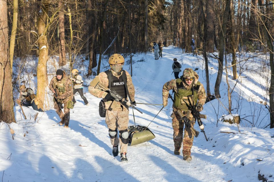 Ukrainian soldiers giving rescue drill training to civilians as Vlad's war approaches its second year