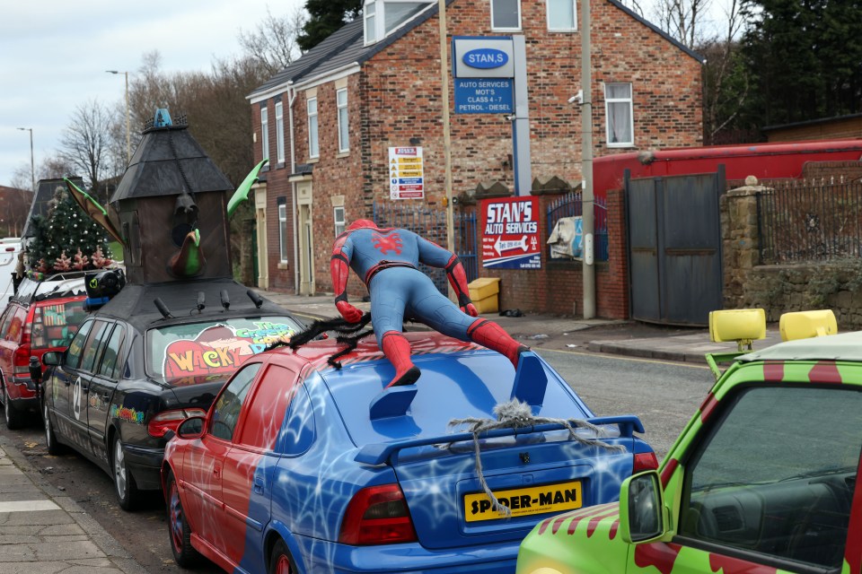 The garage owner has created a whole collection of themed motors over the years, including a Spider-Man one