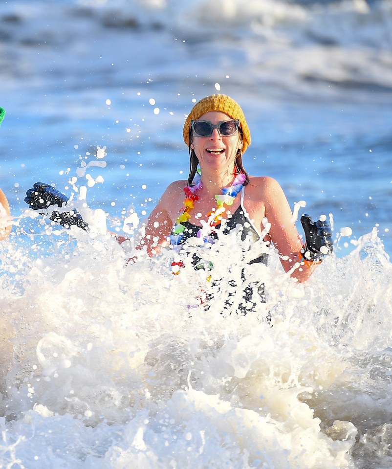 Swimmers took to the water in St Andrews in Fife for the traditional New Year's day swim