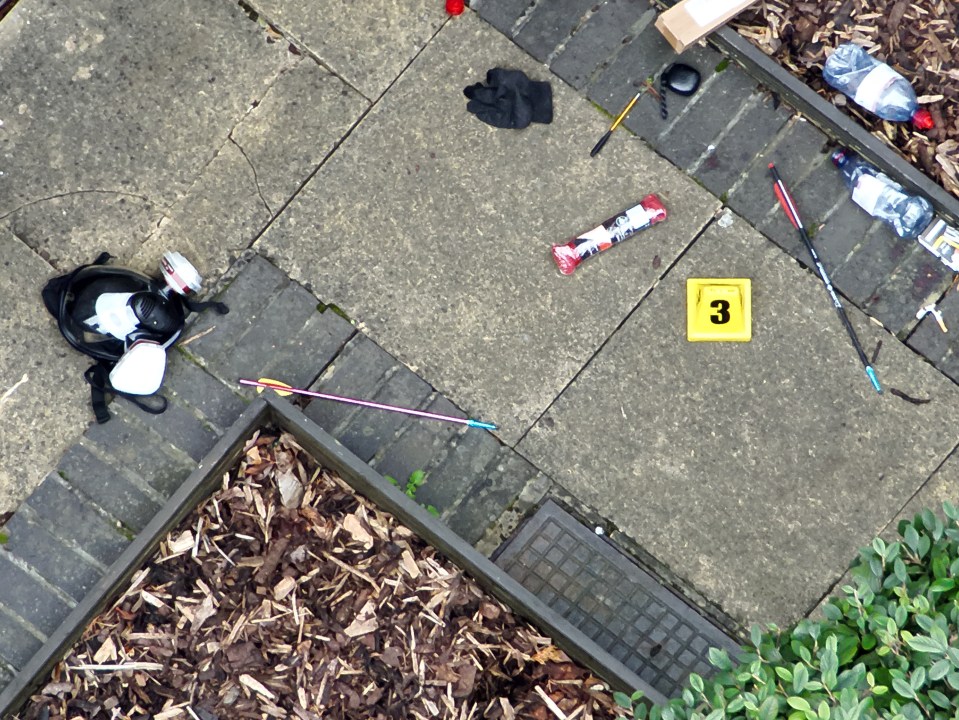 Crime scene markers were placed next to a variety of items including crossbow bolts on Bywater Place