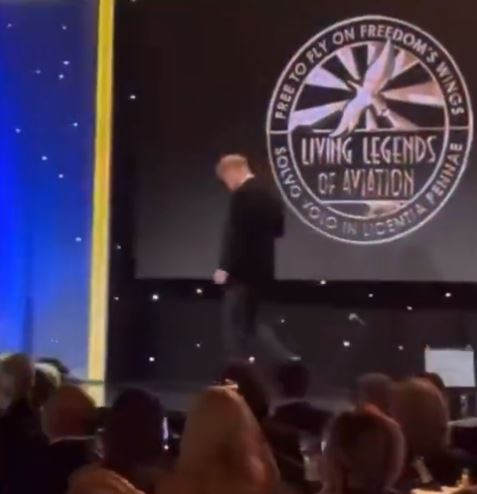 Harry slopes off after accepting the award in front of the D-list crowd