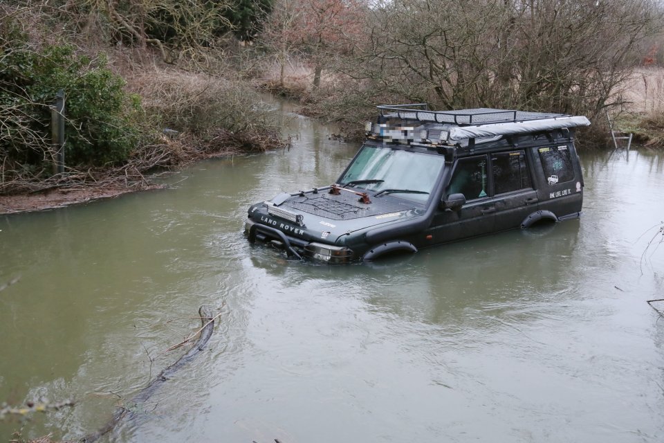 Two people were rescued from this Land Rover near Chelmsford in Essex