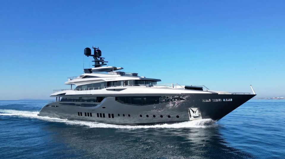 A huge superyacht has had a major revamp and is now a steel grey colour