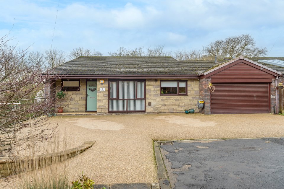 From the front the bungalow looks 'boring'