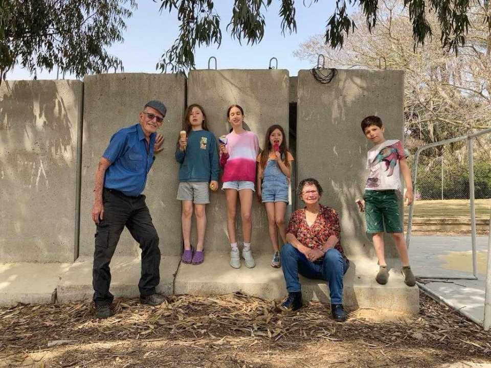 Oded and Yocheved pictured with their grandchildren