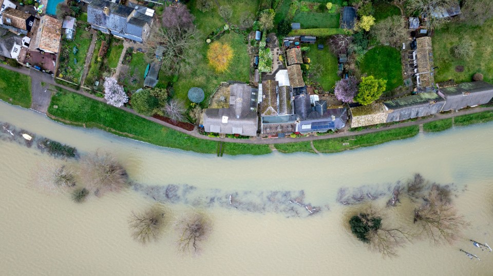 Flooding on the High Street and fields in Holywell in Cambridgeshire today