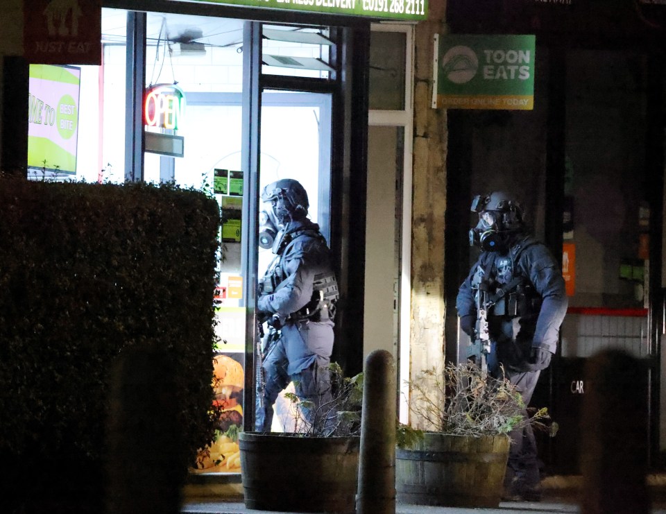 Armed cops in masks carry out a raid at Best Bite in Newcastle-upon-Tyne overnight