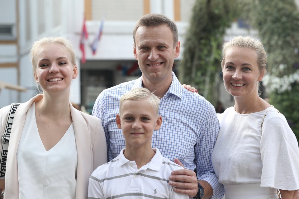 Navalny, with his wife Yulia, right, daughter Daria, and son Zakhar