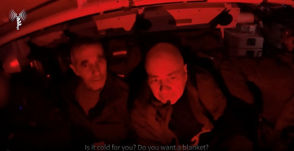 Freed Fernando Simon Marman and Louis Hare are seen on bodycam video sitting with soldiers after the daring rescue operation