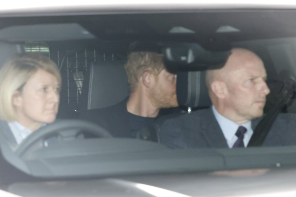 Harry is pictured in his vehicle at 2.40pm, flanked by security, on his trip to London