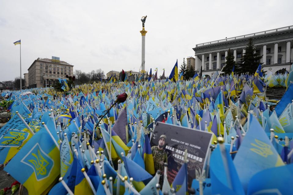 Flags wave across Maidan square in central Kyiv in memorial of the troops