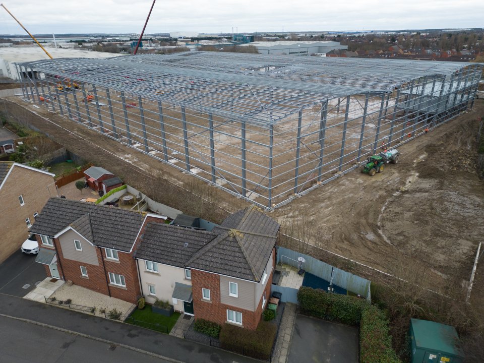 Residents in Corby were stunned by the huge factory being built just feet from their homes