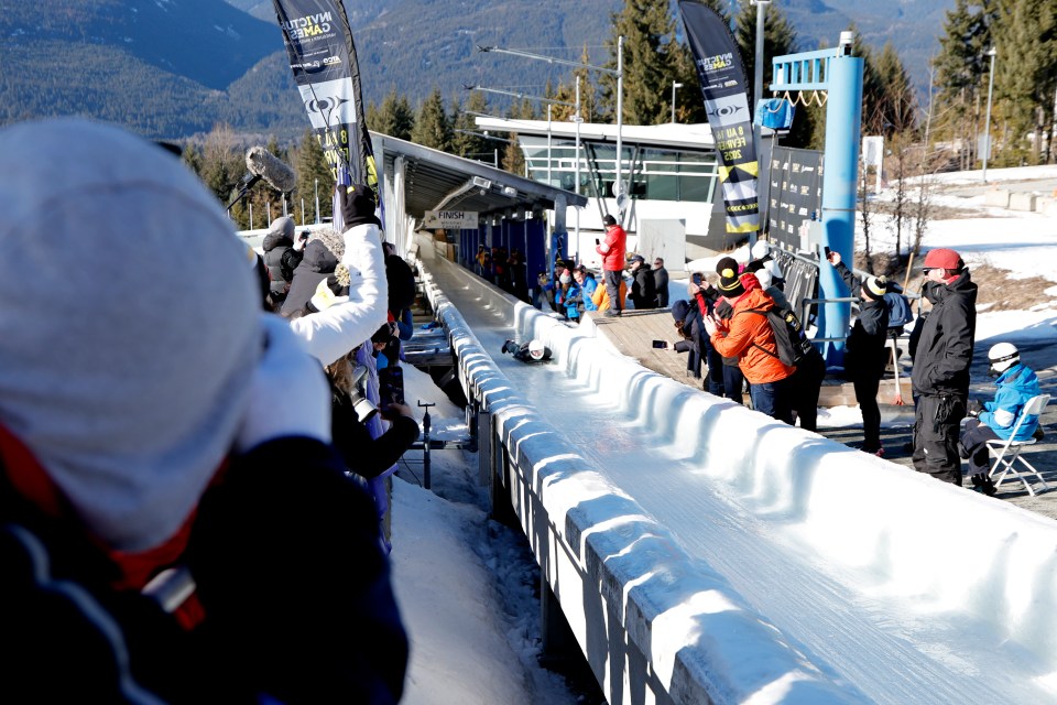 Crowds watched on as Harry whizzed along the ice track