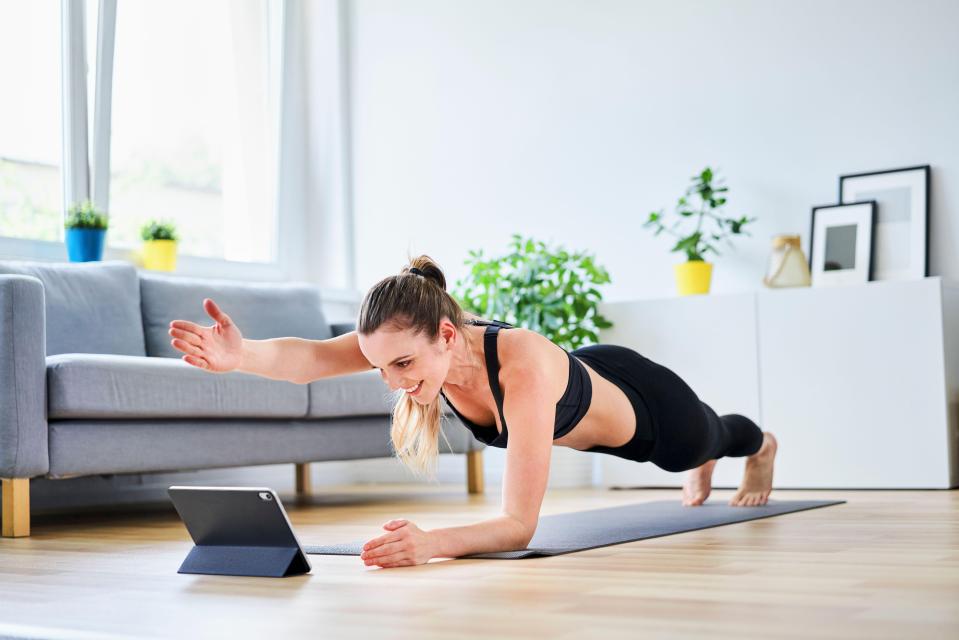 Planks with lateral arm raises work the back and abs