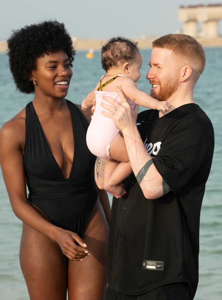 The loved up couple enjoyed showing their daughter the water