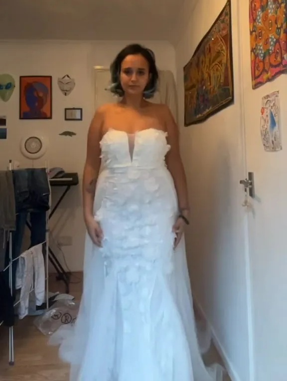 A woman has proudly showed off two wedding dresses that she ordered from Shein for her summer wedding this year