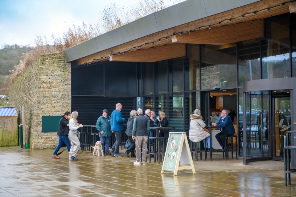 Guests can dine outdoors on bar stools or in booths