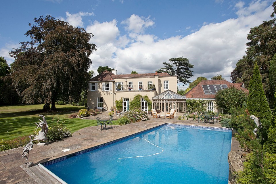 The home also includes a swimming pool and tennis courts