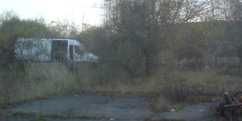 Our exclusive picture shows a white Mercedes Sprinter van parked at a creepy woodland site he later bought