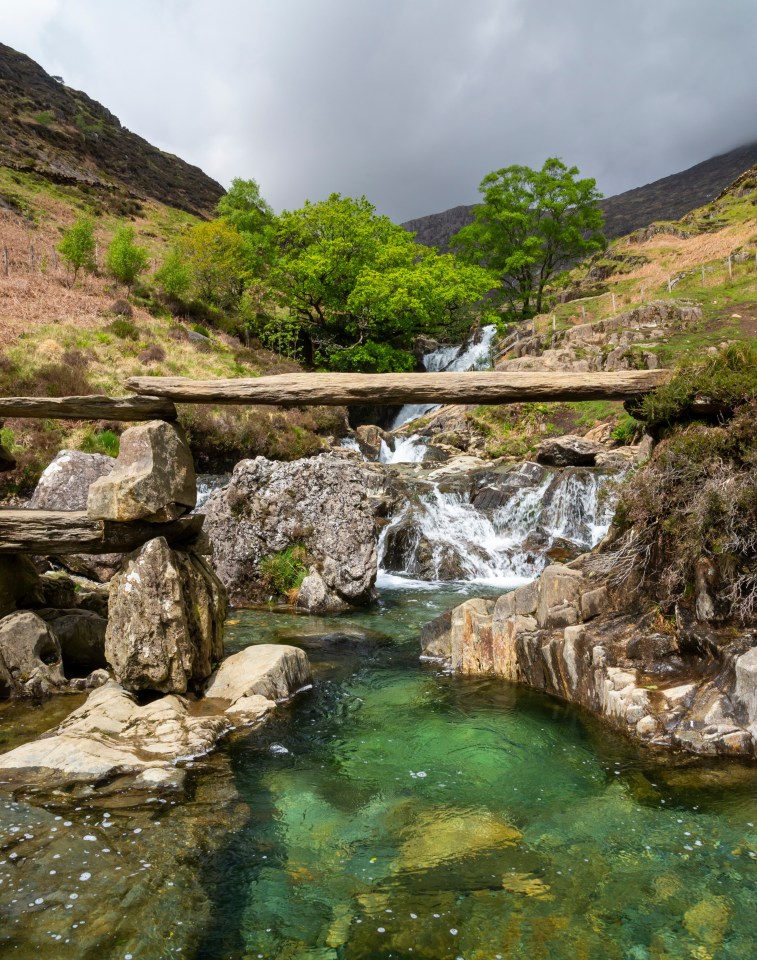 The path runs alongside pools and waterfalls where hikers like to cool off