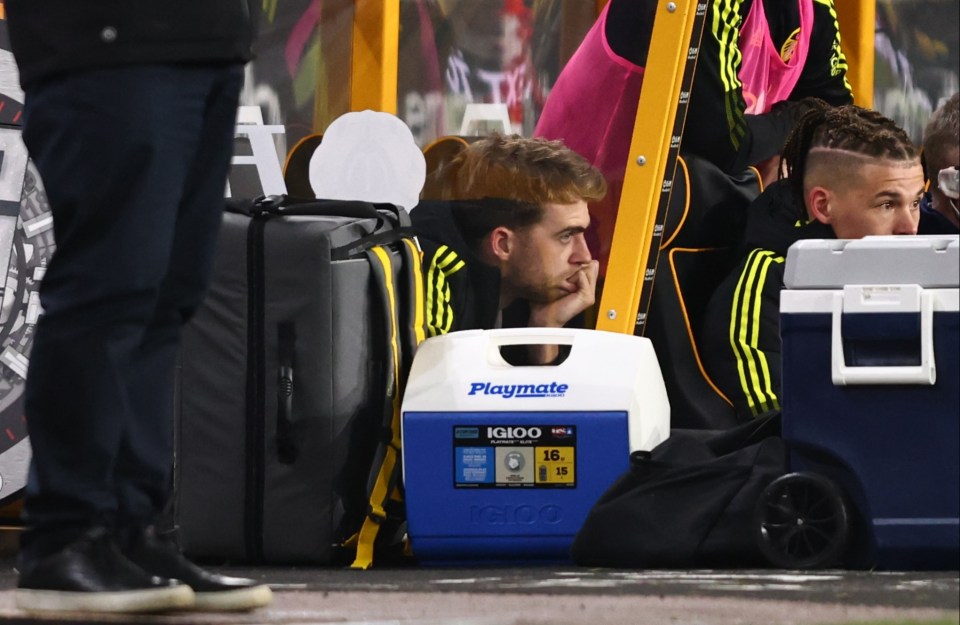 The forward was visibly emotional while sat on the bench at Molineux