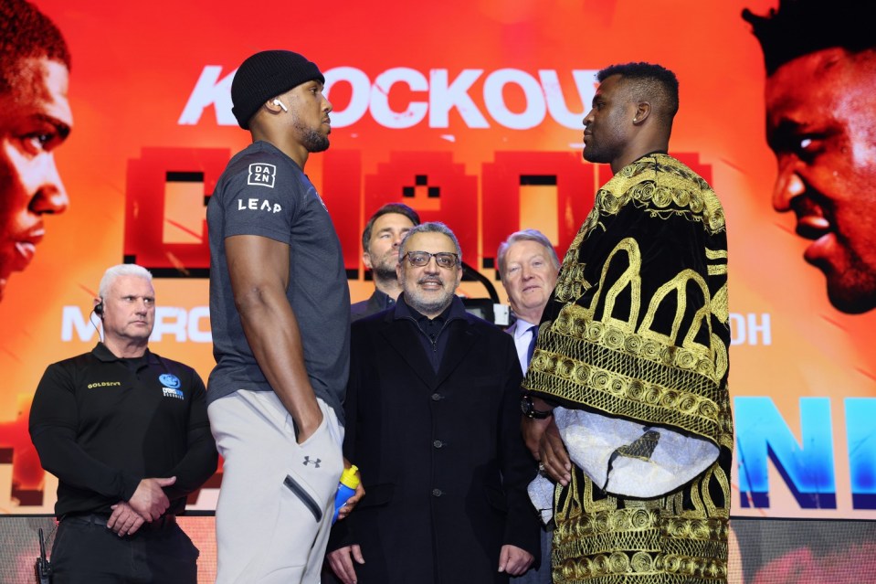 LONDON, ENGLAND - JANUARY 15: Anthony Joshua and Francis Ngannou go head-to-head during the press conference at Outernet London on January 15, 2024 in London, England, to announce their upcoming fight in the Kingdom of Saudi Arabia on 8th March 2023 (Photo by Mark Robinson/Matchroom Boxing via Getty Images).