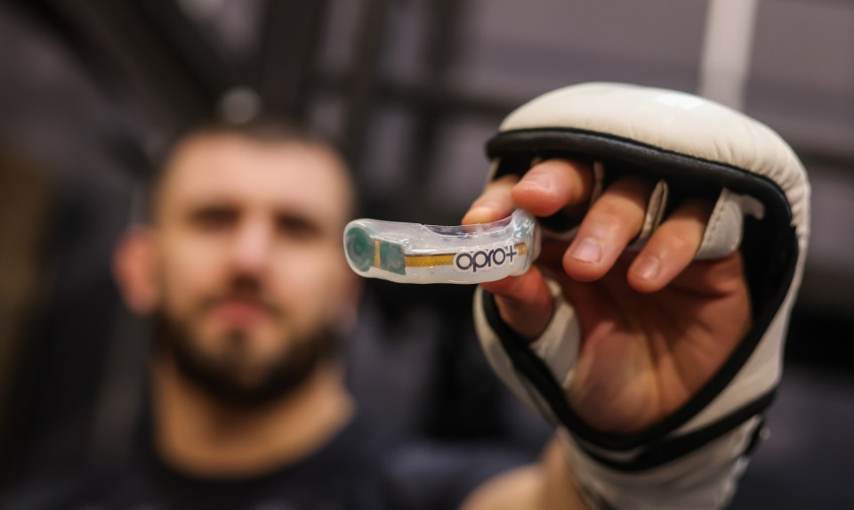 A close up of the smart mouthguard which can measure impact