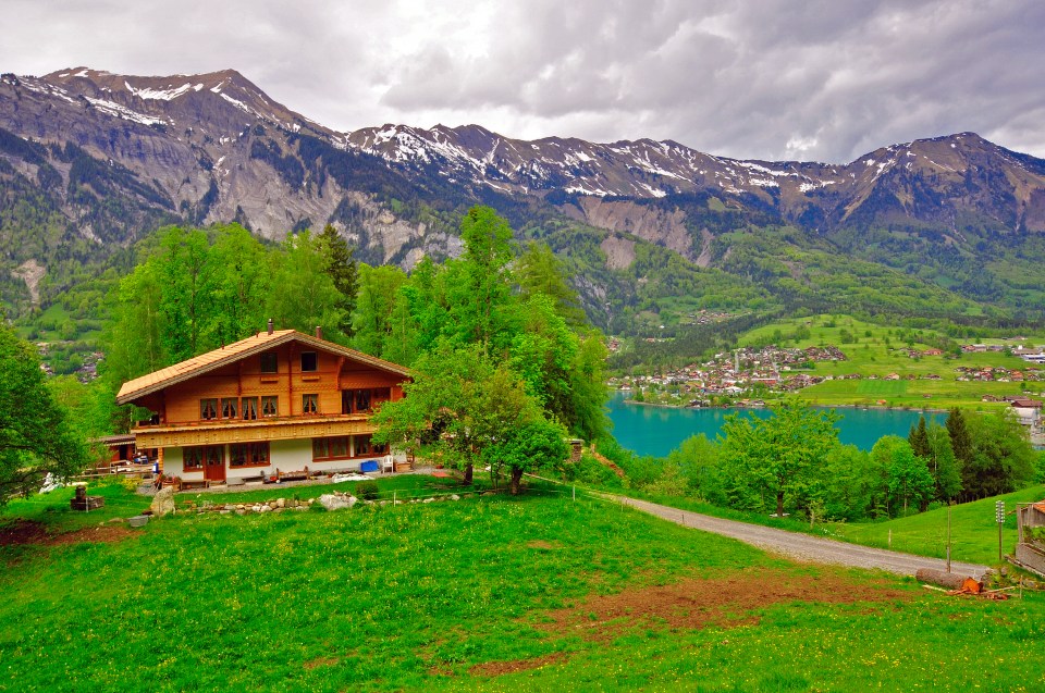 Swiss alps, chalet at the lake