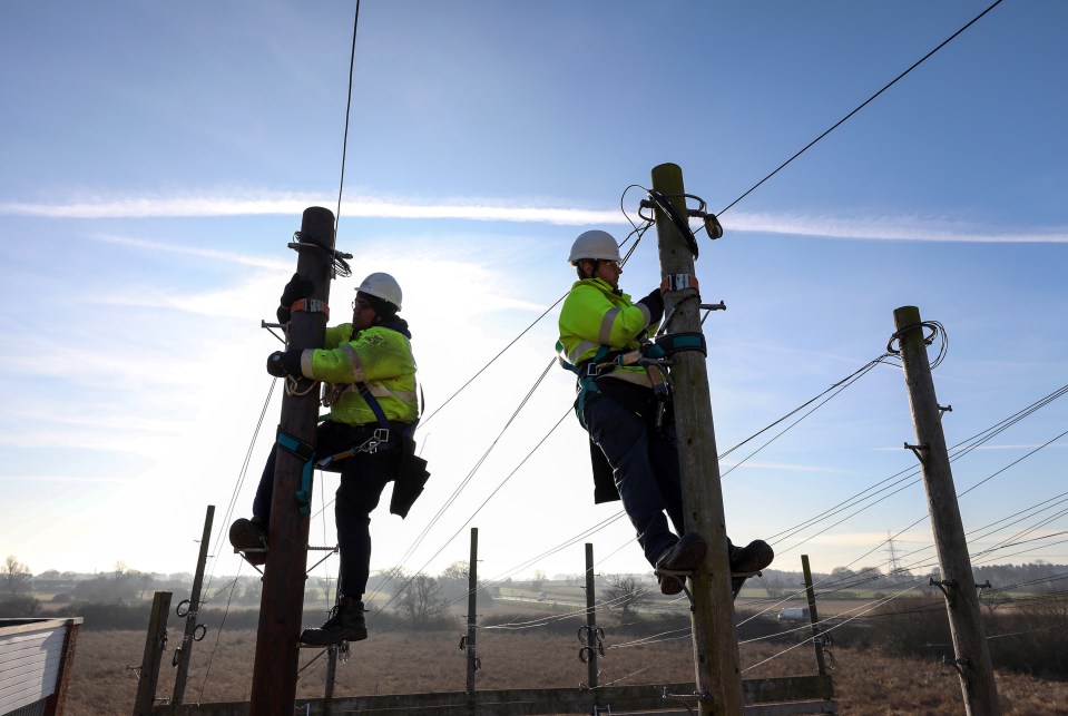 Trainee engineers from BT Openreach, a unit of BT Group Plc, carry out work at the top of telegraph poles at the company's training facility at West Hanningfield, U.K., on Thursday, Jan. 19, 2017. The U.K.'s communications regulator, seeking to spur a roll-out of fiber broadband to homes and businesses, is proposing changes to BT Group Plc's network to ease access for competitors. Photographer: Chris Ratcliffe/Bloomberg via Getty Images