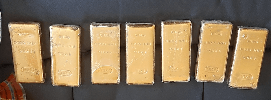 Seven gold-plated bullion bars were found in a punchbag at the flat