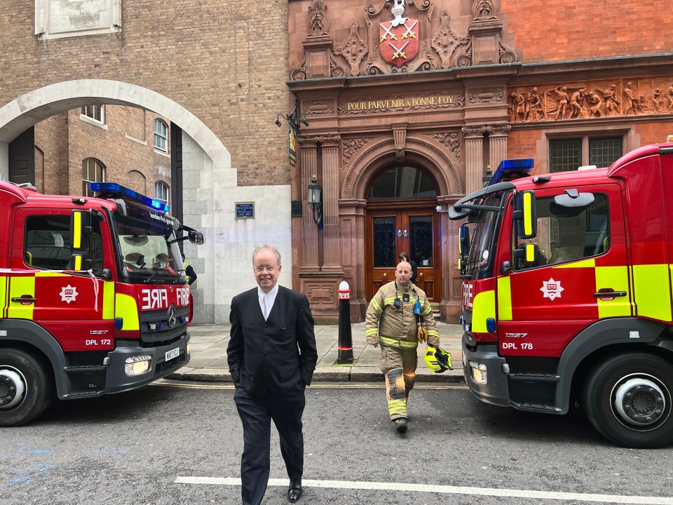 Warwick Lane smelt of heavy smoke as firefighters raced to the scene. Pictured: Recorder of London Judge Mark Lucraft