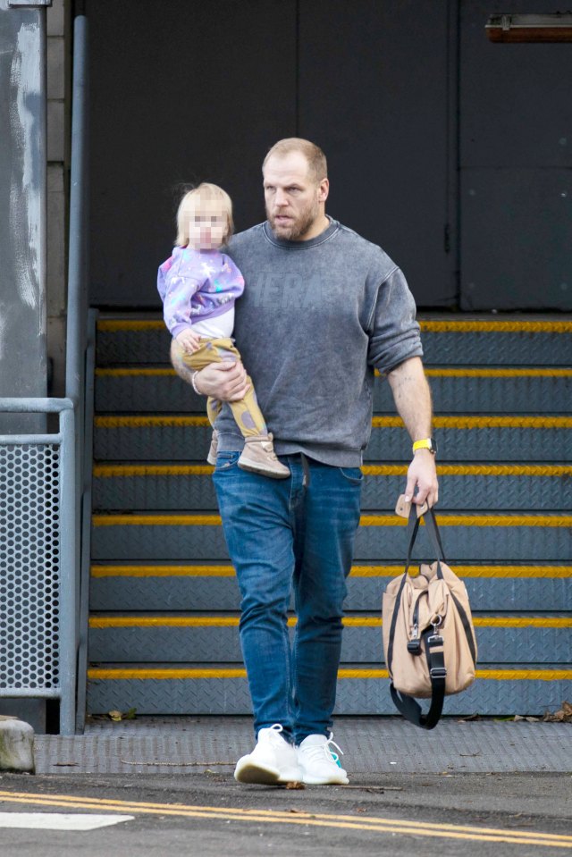 James was seen cuddling the former couple's daughter Bodhi, one