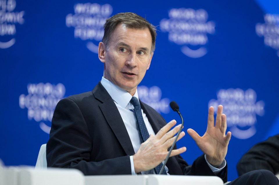 Britain's Chancellor of the Exchequer Jeremy Hunt attends a session on Artificial Intelligence (AI) during the World Economic Forum (WEF) annual meeting in Davos on January 18, 2024. (Photo by Fabrice COFFRINI / AFP) (Photo by FABRICE COFFRINI/AFP via Getty Images)