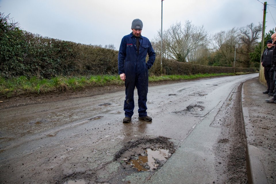 Locals in Wrenbury-cum-Frith are furious at having 174 potholes on a single 200-yard stretch of road