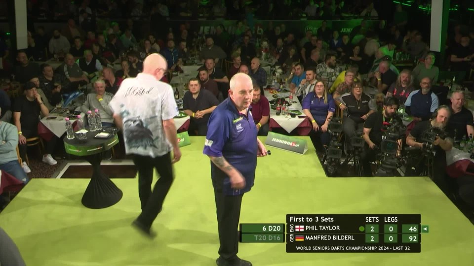 Phil Taylor’s Senior Darts Championship adventure came to an end in the first round