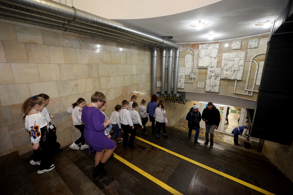 © Picture by Peter Jordan..Story by Jerome Starkey..Children affected by the war in Ukraine are schooled in makeshift classrooms that have been built on the platforms of the citys Metro system in undisclosed stations around Kharkiv in Ukraine..There are 5 stations in total round the city. These are pictures from one of the Metro stations..Picture shows The kids going to lessons underground....Job Reference Number . NINTCHDBJOBS000001068507..Today Thursday 22nd February 2024.. .....The Sun Picture by Peter Jordan.