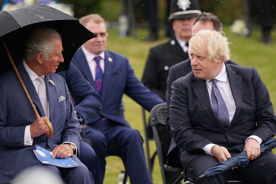 The Prince of Wales (left) greets Prime Minister Boris Johnson at the unveiling of the UK Police Memorial at the National Memorial Arboretum at Alrewas, Staffordshire. The ¿4.5 million memorial commemorates all personnel who have lost their lives since the 1749 formation of the Bow Street Runners. Picture date: Wednesday July 28, 2021. PA Photo. See PA story POLICE Memorial. Photo credit should read: Jacob King/PA Wire