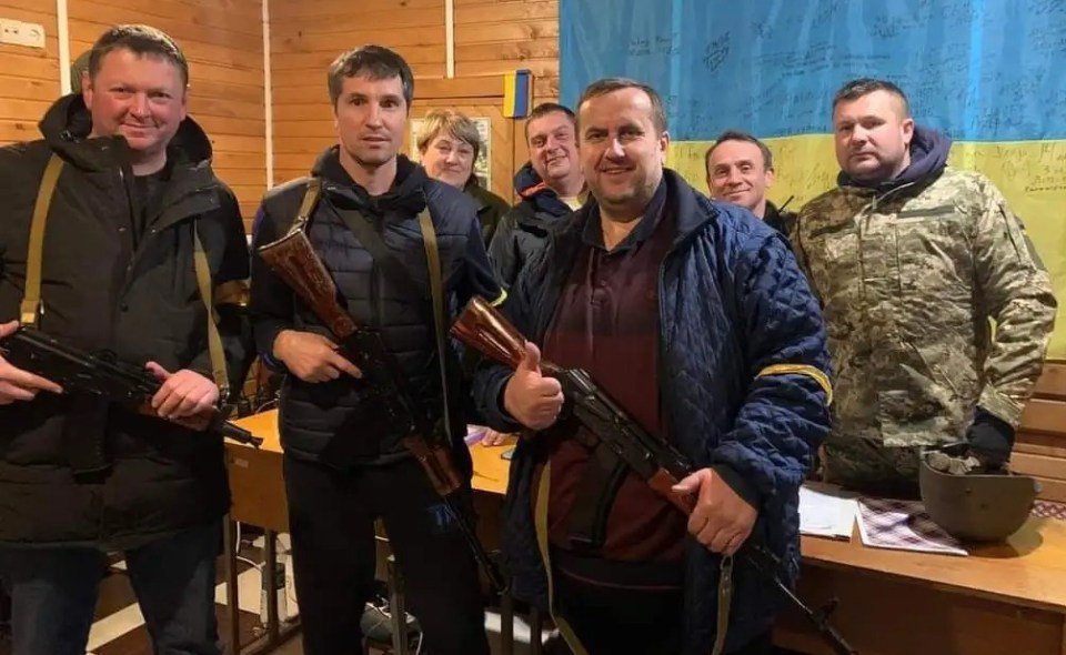 Dzinziruk (second from left) now fights in Kyiv's Territorial Defence unit