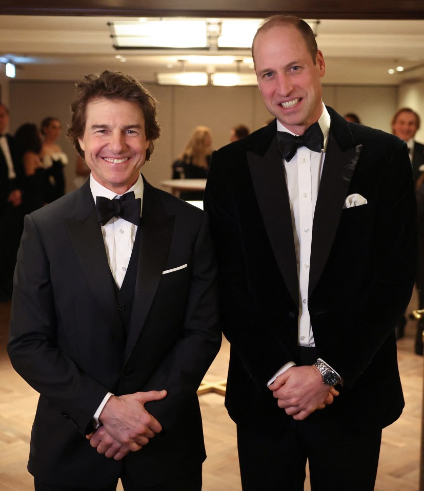 Prince William poses for a photo with Tom Cruise at the charity gala