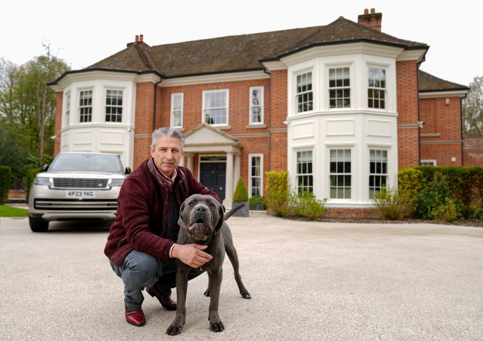 Alfie Best with guard dog Pablo outside his £6m mansion in Surrey