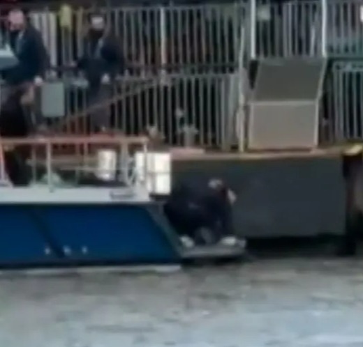 This is believed to be the moment cops pulled Ezedi's body out of the Thames