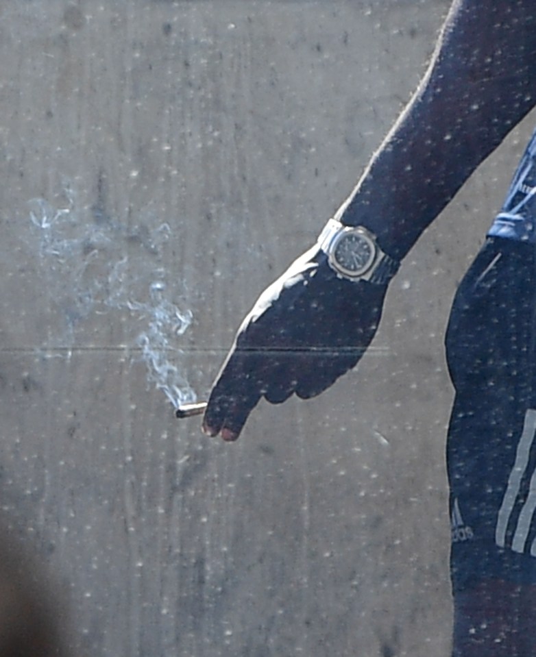 Stormzy holding the suspicious looking cigarette