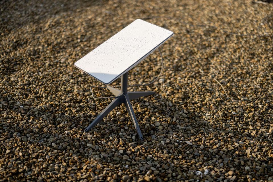 Starlink satellite dish on gravel