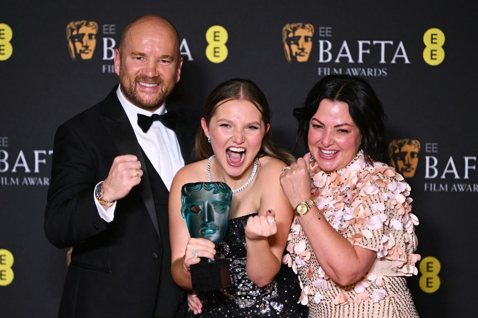 Mia at the Baftas with her parents Angela and Wayne