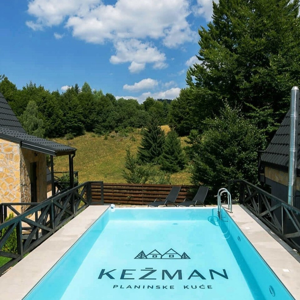 A temperature controlled outdoor pool is open for guests to use in the summer and has stunning views of the mountains