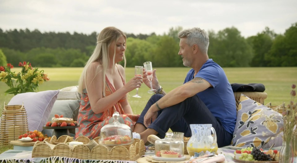 The pair raise a glass of bubbly on the TV show