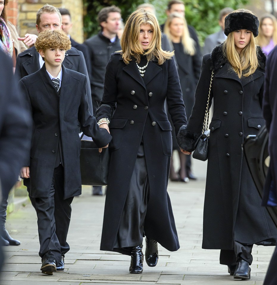 Kate with her kids Darcey and Billy at Derek's funeral on Friday