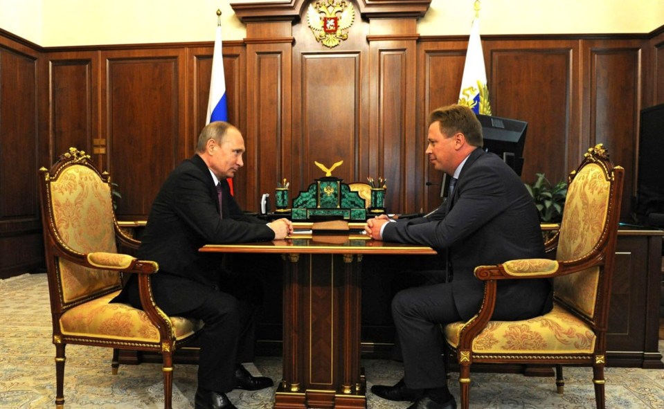 Ovsyannikov pictured with Vladimir Putin