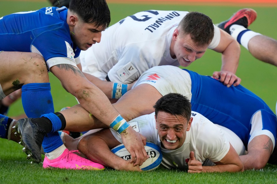 Alex Mitchell was all smiles as he scored a crucial try in Italy