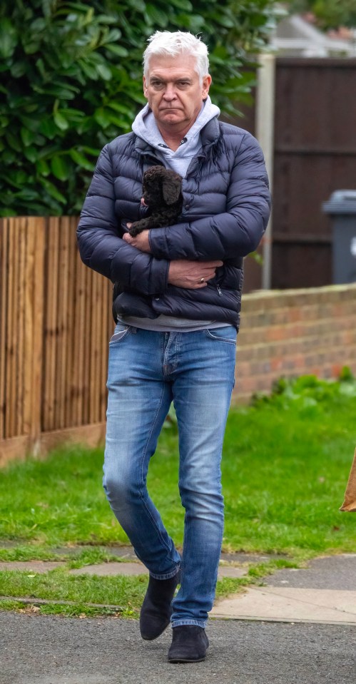 Phillip Schofield looked downbeat in West London yesterday